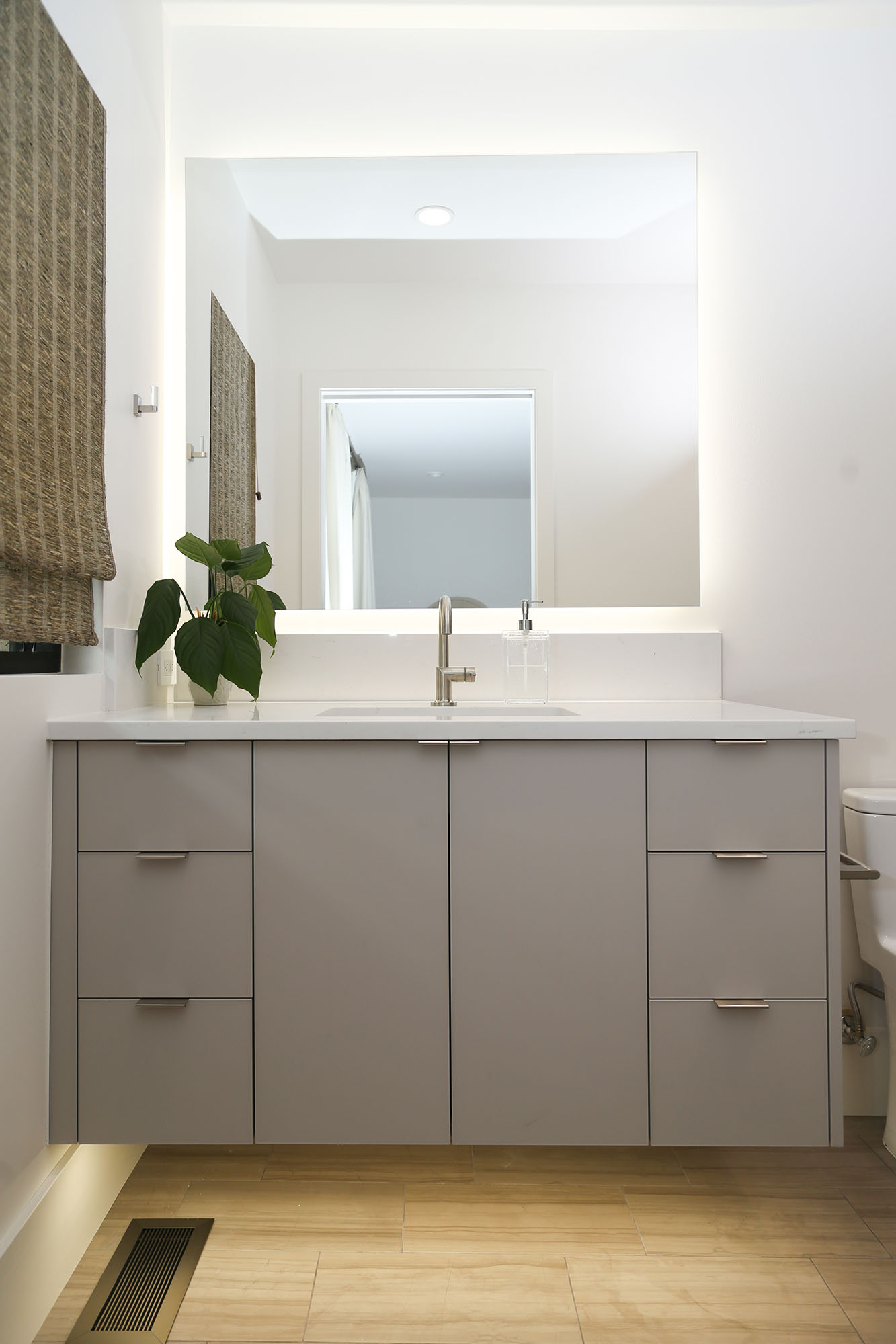 Gray Vanity Cabinet Storage White Counter Backsplash Wood Floor Elite Cabinets Bathroom Cabinet Design