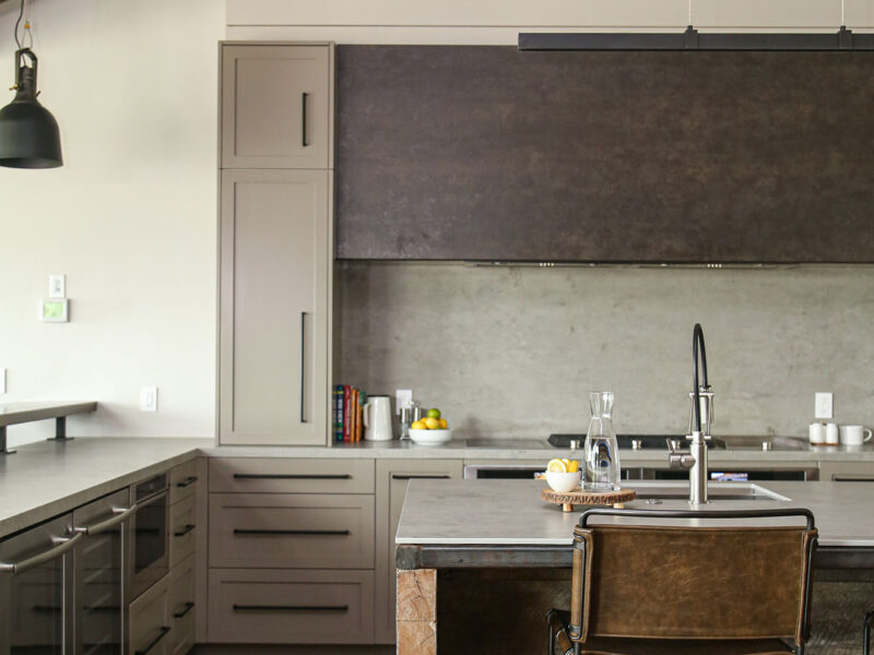 Kitchen Island Deco Pendants Vaulted Ceiling Wood Floor Gas Range White Counters Elite Cabinets Kitchen Remodel