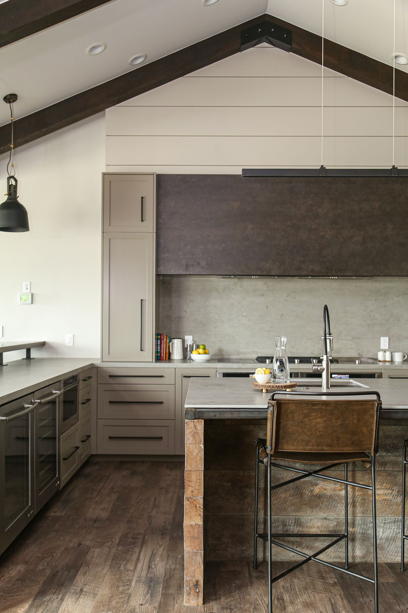 Kitchen Island Deco Pendants Vaulted Ceiling Wood Floor Gas Range White Counters Elite Cabinets Kitchen Remodel