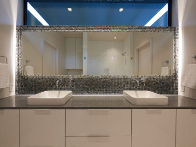 Midtown Tulsa Master Bathroom Vanities Vessel Sinks Tile Wrapped Mirror White Cabinet Storage Gray Counter Top Elite Cabinets Tulsa Master Bathroom