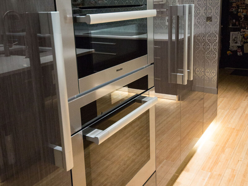 Tall Pantry Storage Ovens Refrigerator Wood Grain Flat European Cabinets Wood Floors Elite Cabinets Tulsa Kitchen Design