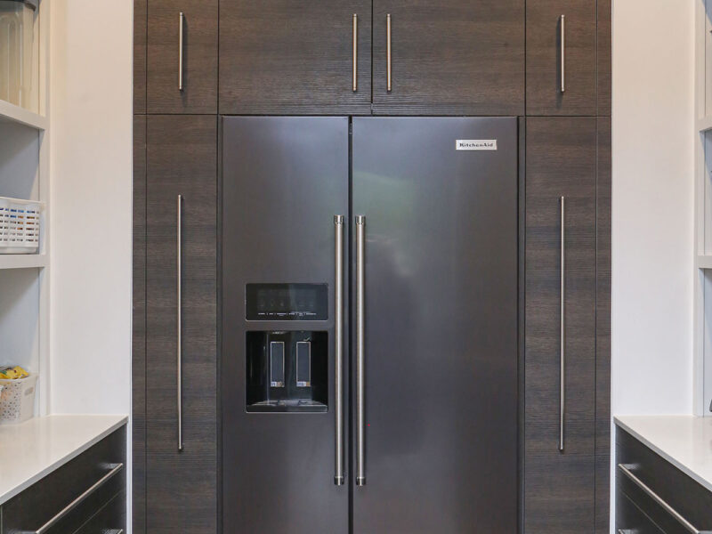 Tall Refrigerator Storage Flat Panel Cabinet Panels Wood Grain Finish White Counters Elite Cabinets Tulsa Kitchen Remodel