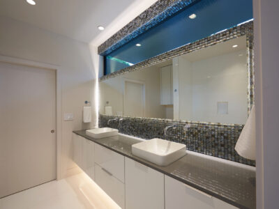 Tulsa Master Bathroom Vanities Vessel Sinks Tile Wrapped Mirror White Cabinet Floor Lit Storage Gray Counter Top Elite Cabinets Midtown Tulsa Master Bathroom