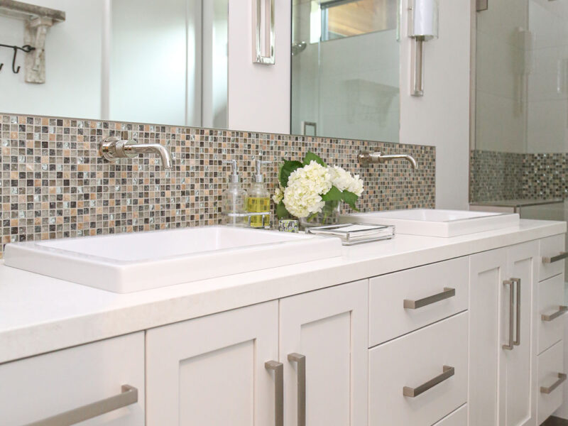Vanity Double Vessel Sinks White Countertop Mirrors Wall Sconces White Cabinet Storage Elite Cabinets Bathroom Remodel