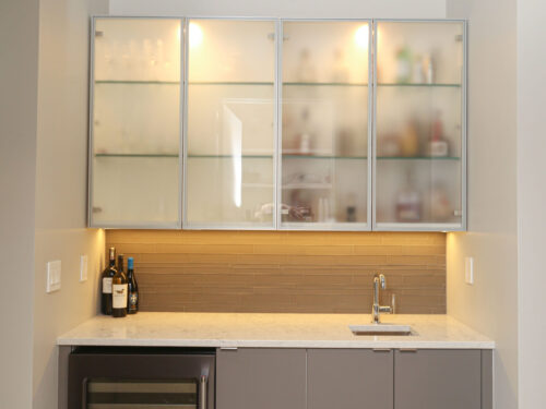 Beverage Flat Panel Cabinets Beverage Refrigerator Lighted Frosted Glass Wall Cabinet Storage White Counters Bar Sink Elite Cabinets Tulsa Cabinet Designer