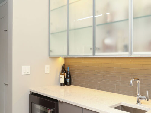 Beverage Space Cabinets Tile Backsplash Beverage Refrigerator Lighted Frosted Glass Wall Cabinet Storage White Counters Bar Sink Elite Cabinets Tulsa Cabinet Designer